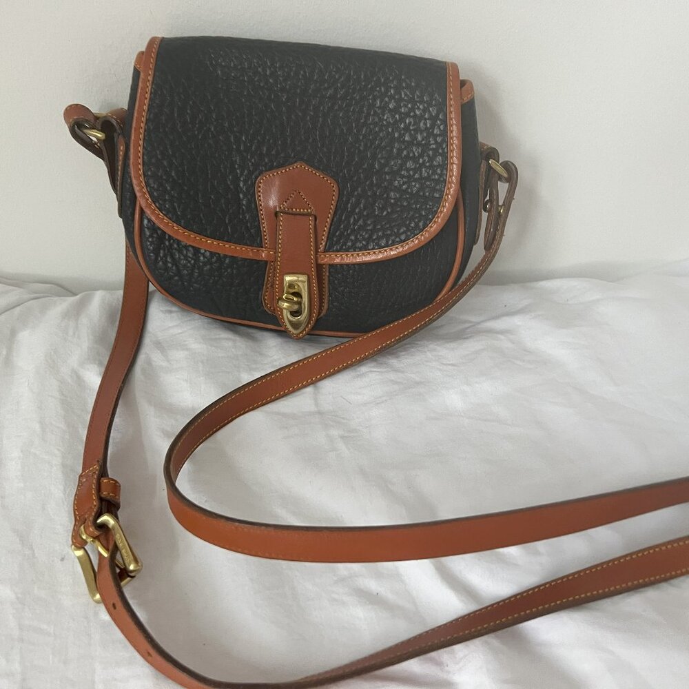 Dooney & Bourke navy leather with brown trim small crossbody